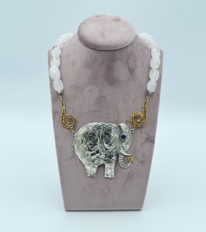 Collana di cristallo di rocca con centrale in argento