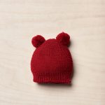 Berretto lana due pom pom